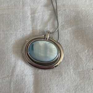 NECKLACE WITH A WHITE AND BLUE STONE IT FLIPS TO WEAR EITHER WAY!!